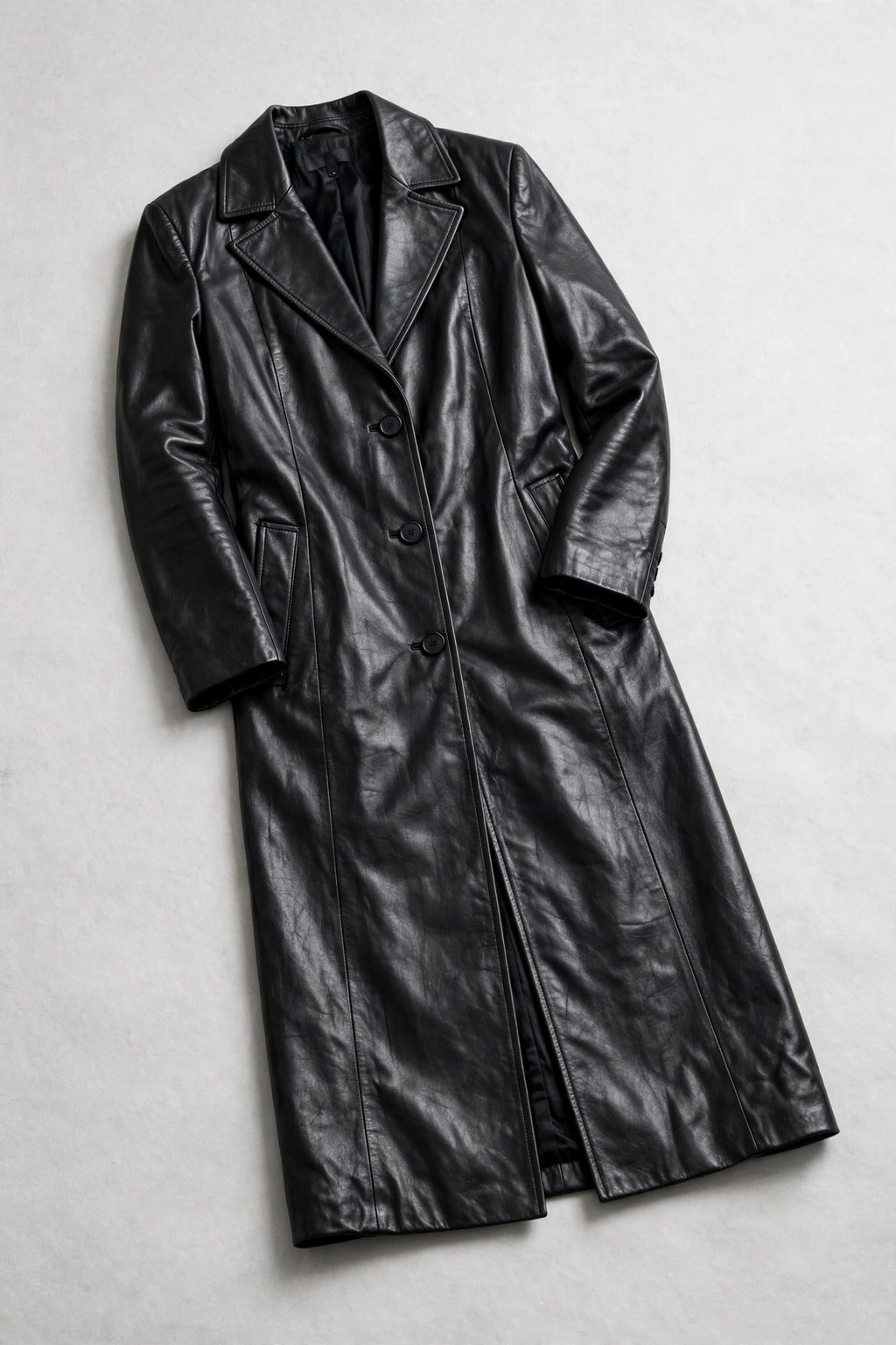 Aria Black Leather Long Coat - Black, flat lay, angled