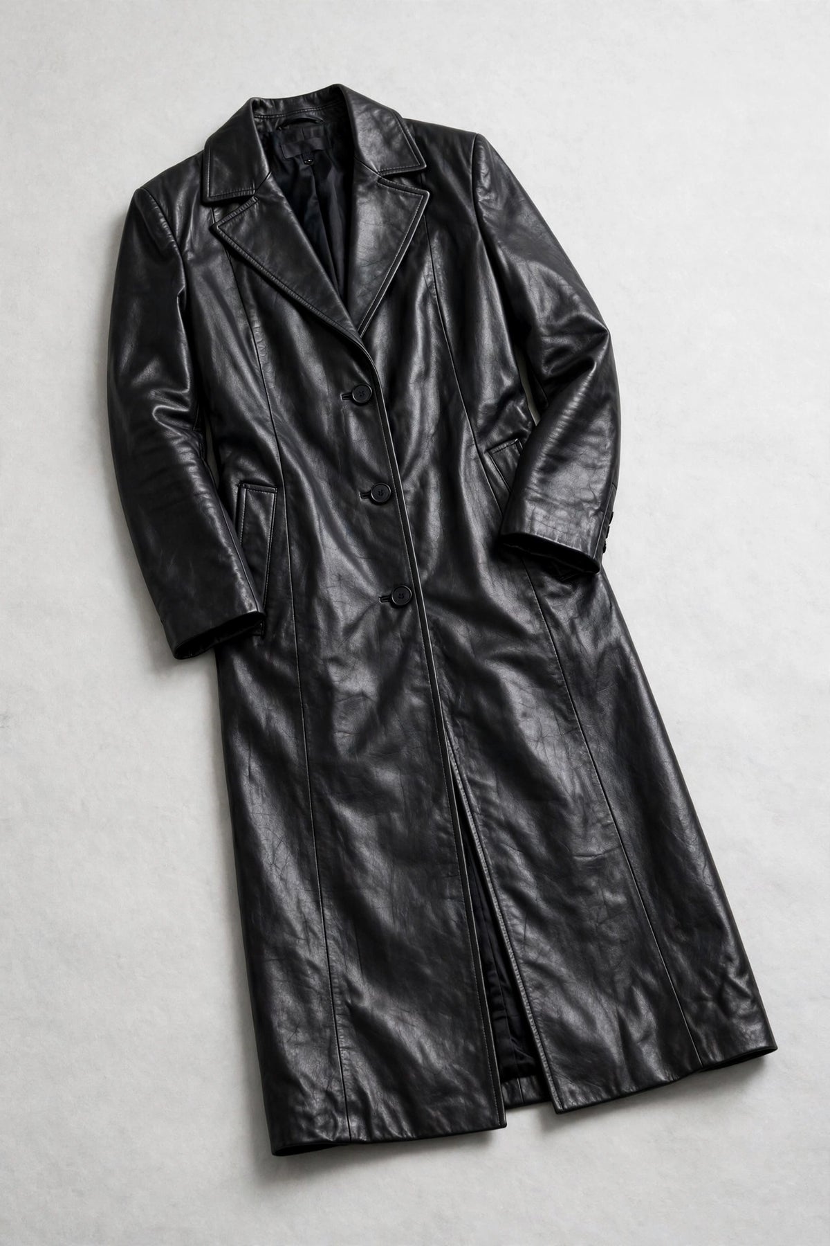 Aria Black Leather Long Coat - Black, flat lay, angled