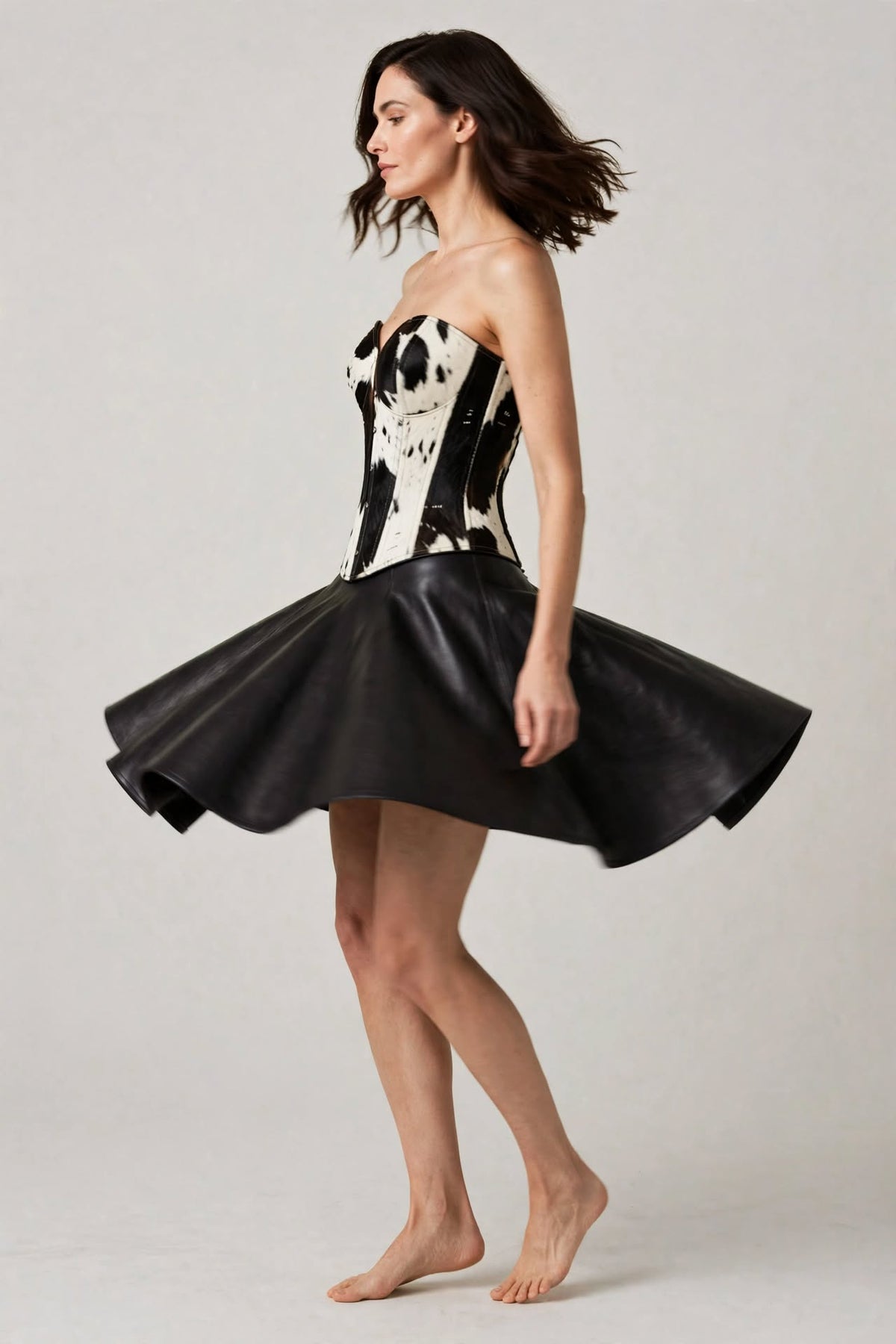 Dolly Hair-On Cowhide Corset Leather Skater Dress - Black & White, twirl showing skirt movement